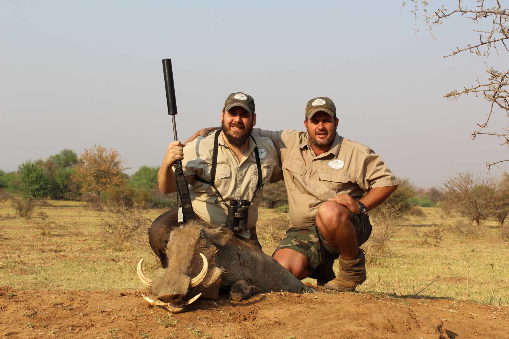 A client next to their hunting trophy