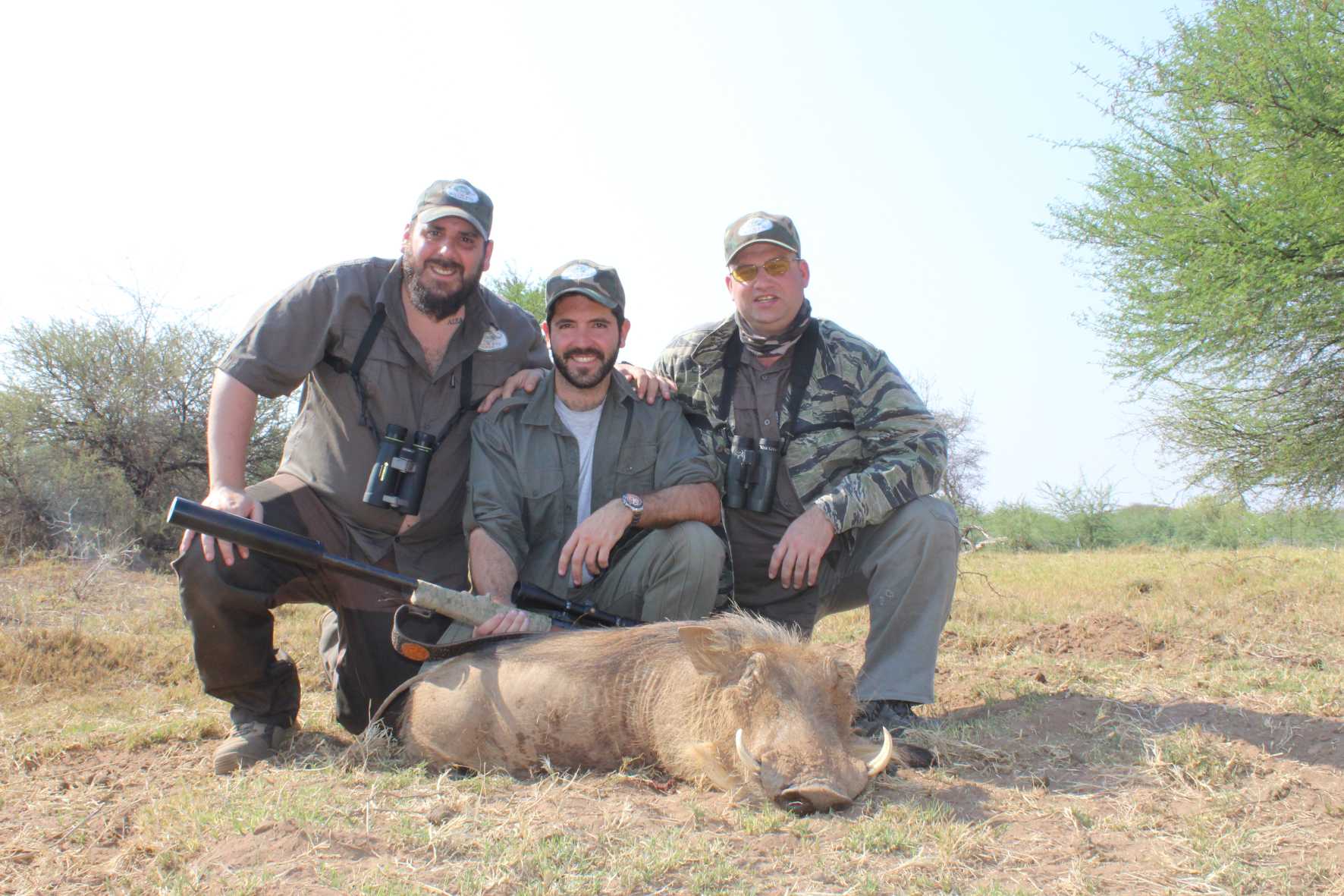 A client next to their hunting trophy