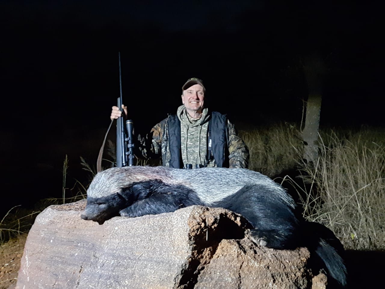 A client next to their hunting trophy