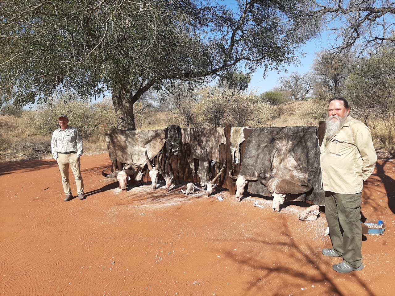 A client next to their hunting trophy