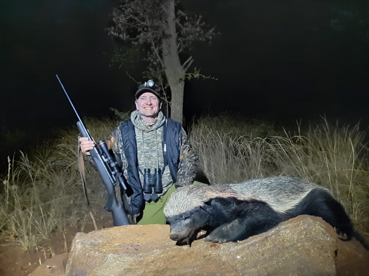 A client next to their hunting trophy