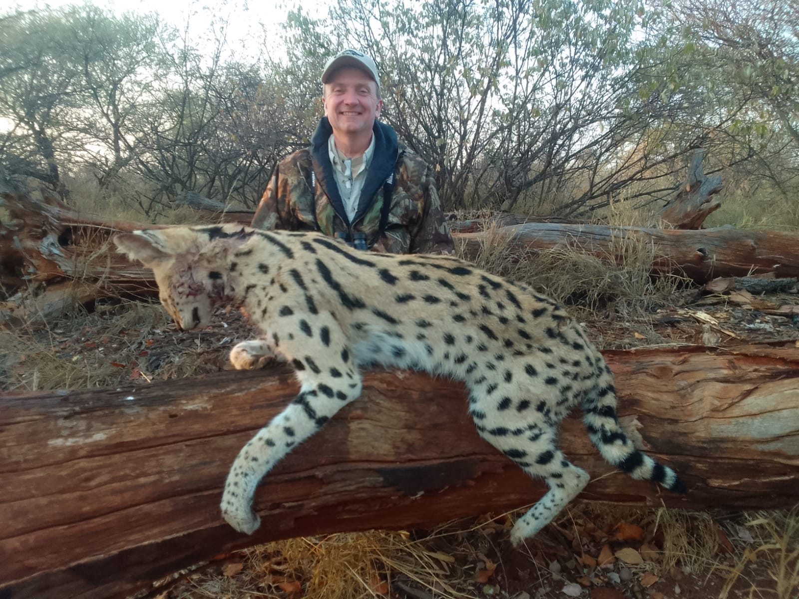 A client next to their hunting trophy