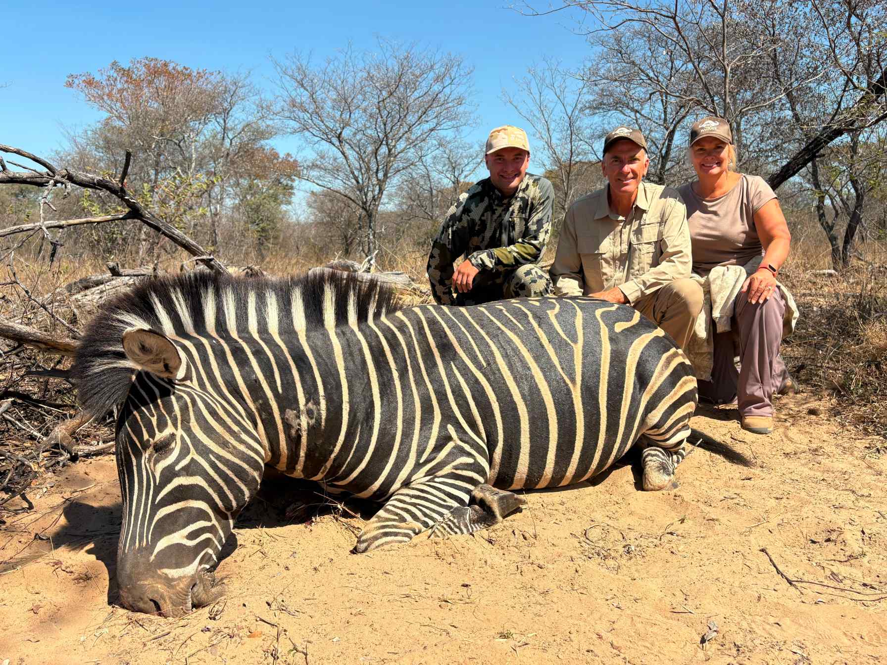 A client next to their hunting trophy